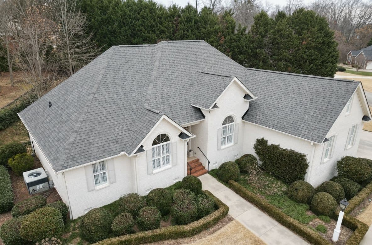 A Northern Virginia home's roof before renewal, aged and weathered